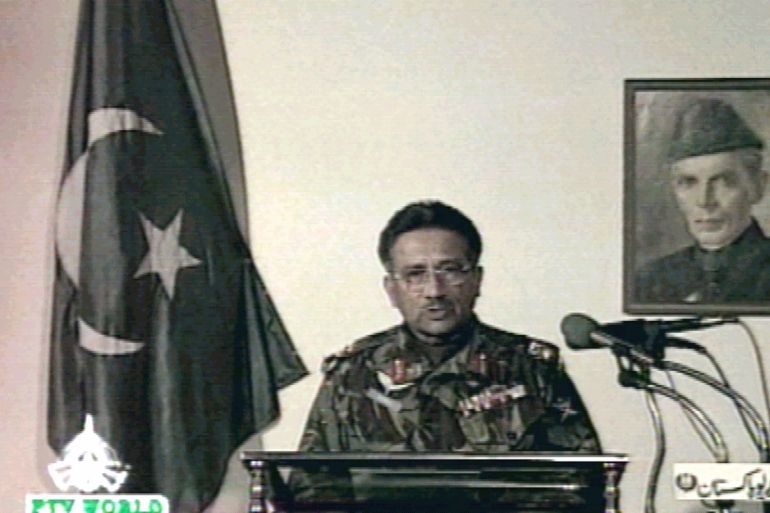 Pakistani army chief General Pervez Musharraf speaks on state television in front of a picture of the founder of Pakistan, Mohammed Ali Jinnah, October 13. Pakistan [Prime Minister Nawaz Sharif] was toppled in a military coup on Tuesday, and Musharraf said the army moved in to save a deteriorating situation.**POOR TV QUALITY DOCUMENT**