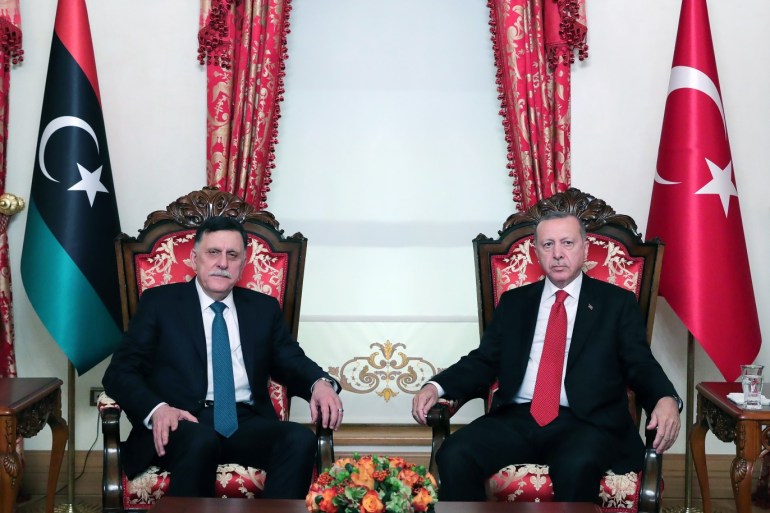 President of Turkey Erdogan meets Fayez Al-Sarraj- - ISTANBUL, TURKEY - NOVEMBER 27: President of Turkey, Recep Tayyip Erdogan (R) meets Leader of Libya’s UN-recognized government, Fayez Al-Sarraj (L) as they pose for a photo at Dolmabahce Office in Istanbul, Turkey on November 27, 2019.
