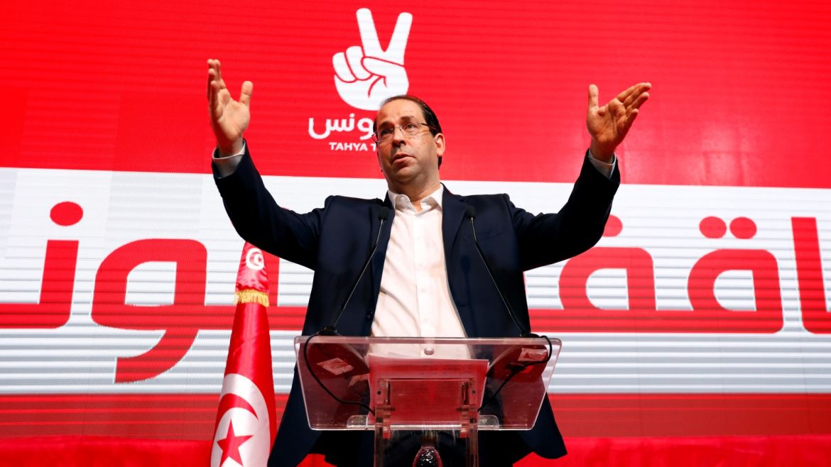 Tunisia's Prime Minister Youssef Chahed, leader of the secular Tahya Tounes party, speaks during a rally in Tunis, Tunisia August 8, 2019. Picture taken August 8, 2019. REUTERS/Zoubeir Souissi