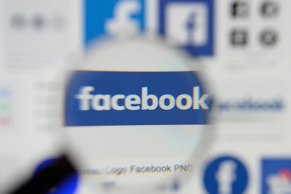 Facebook logos are seen on a screen in this picture illustration taken December 2, 2019. REUTERS/Johanna Geron/Illustration