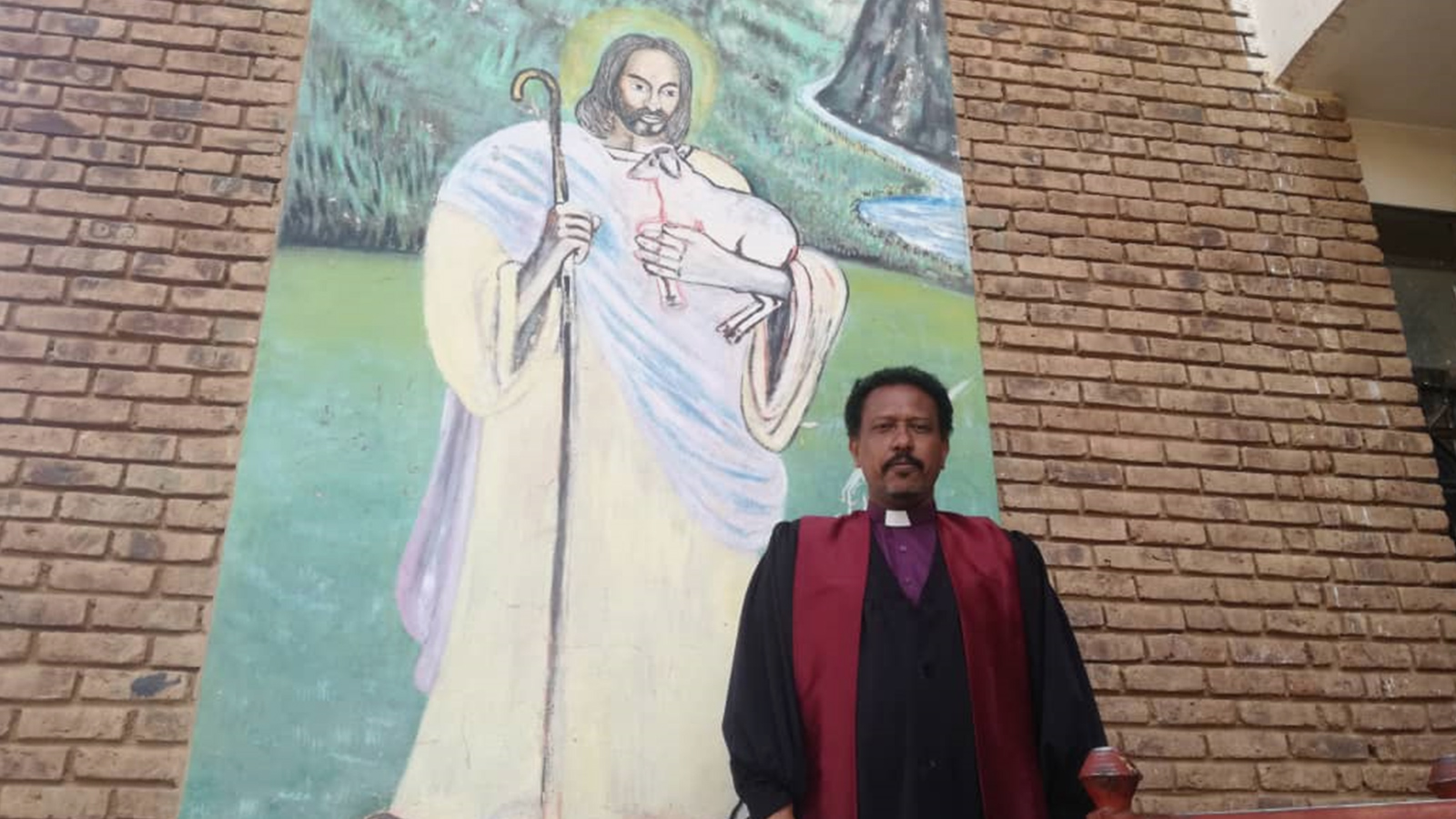 ‪القس دستا: لدينا أمل ورجاء كبيران بأن يحقق التغيير في السودان خطط وأهداف الكنيسة‬ (الجزيرة)