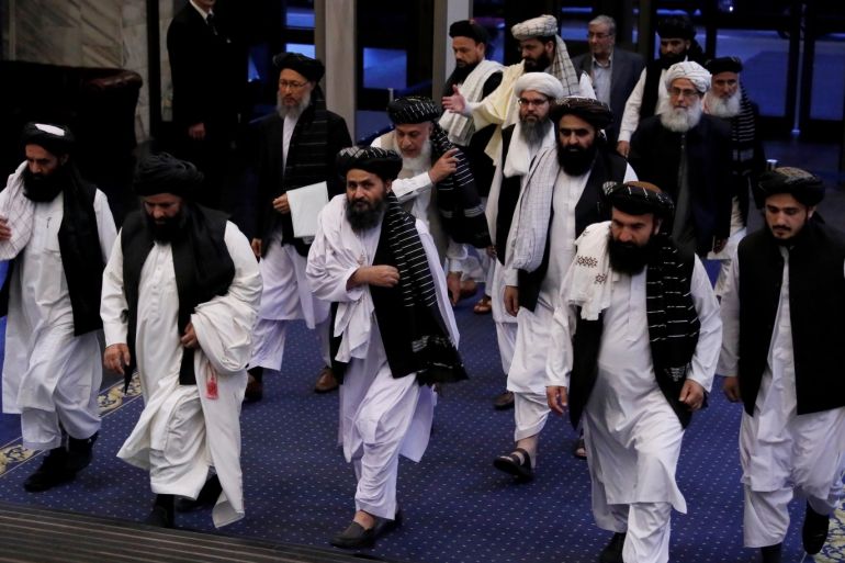 Taliban officials led by the movement's chief negotiator Mullah Abdul Ghani Baradar (C, front) attend peace talks between senior Afghan politicians and Taliban negotiators in Moscow, Russia May 29, 2019. REUTERS/Evgenia Novozhenina