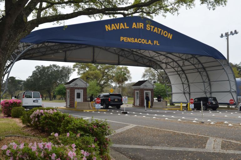 The main gate at Naval Air Station Pensacola is seen on Navy Boulevard in Pensacola, Florida, U.S. March 16, 2016. Picture taken March 16, 2016. U.S. Navy/Patrick Nichols/Handout via REUTERS. THIS IMAGE HAS BEEN SUPPLIED BY A THIRD PARTY.