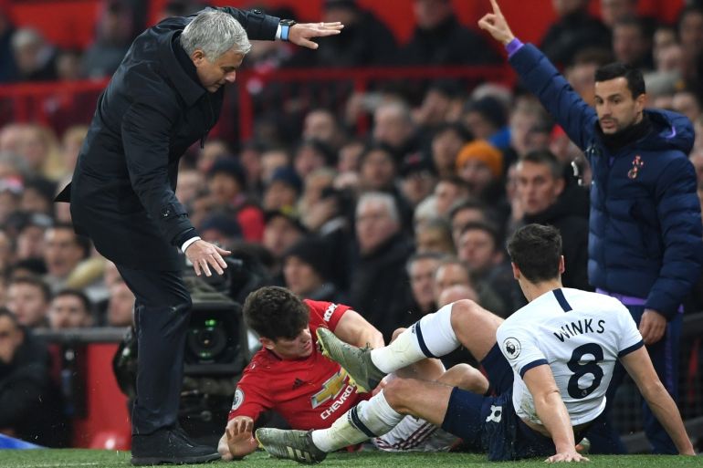 MANCHESTER, ENGLAND - DECEMBER 04: Daniel James of Manchester United collides into Jose Mourinho, Manager of Tottenham Hotspur as he is tackled by Harry Winks of Tottenham Hotspur during the Premier League match between Manchester United and Tottenham Hotspur at Old Trafford on December 04, 2019 in Manchester, United Kingdom. (Photo by Stu Forster/Getty Images)