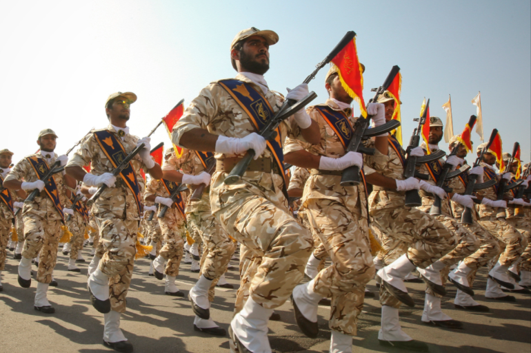 Members of the Iranian revolutionary guard march during a parade to commemorate the anniversary of the Iran-Iraq war in Tehran September 2011 REUTERSStringerFile Photo.png