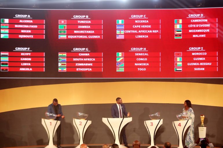 Soccer Football - 2022 World Cup - African Qualifiers Draw - Nile Ritz-Carlton Hotel, Cairo, Egypt - January 21, 2020 General view of French former professional footballer Marcel Desailly and Ivory Coast coach Clementine Toure on stage during the draw REUTERS/Mohamed Abd El Ghany