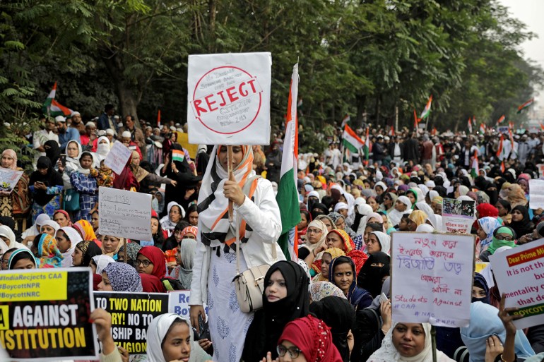 epa08116671 Indian Muslims shout against Indian Prime Minister Narendra Modi during a protest march against Citizenship Amendment Bill (CAB) and National Register of Citizens (NRC) issue in Kolkata, India, 10 January 2019. Protesters are calling on central government to withdraw drafting National Register of Citizens (NRC) record. EPA-EFE/PIYAL ADHIKARY