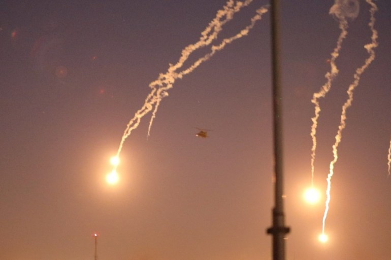 U.S. Army AH-64 Apache helicopters from 1st Battalion, 227th Aviation Regiment, 34th Combat Aviation Brigade, launch flares as they conduct overflights of the U.S. Embassy in Baghdad, Iraq December 31, 2019.  U.S. Army/Spc. Khalil Jenkins/CJTF-OIR Public Affairs/Handout via REUTERS.  THIS IMAGE HAS BEEN SUPPLIED BY A THIRD PARTY.