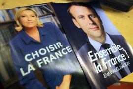 Electoral documents for the upcoming second round of 2017 French presidential election are displayed as registered voters will receive an envelope containing the declarations of faith of each candidate, Emmanuel Macron (R) and Marine Le Pen (L), along with the two ballot papers for the May 7 second round of the French presidential election, in Nice, France, May 3, 2017. REUTERS/Eric Gaillard