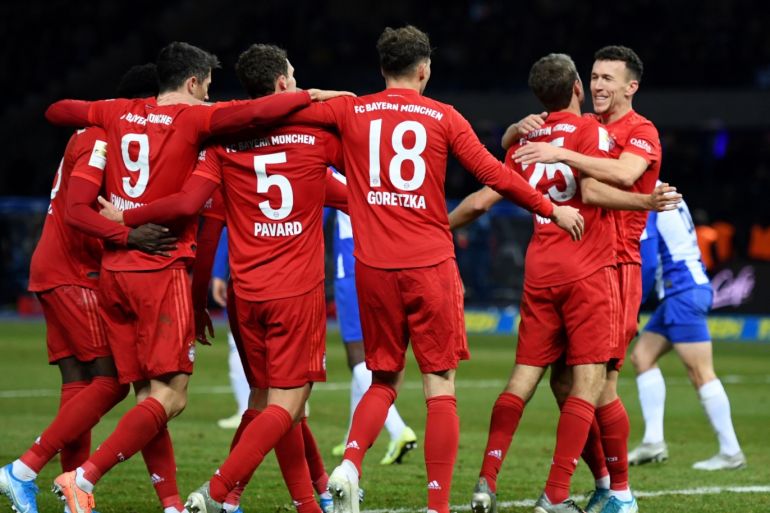 Soccer Football - Bundesliga - Hertha BSC v Bayern Munich - Olympiastadion, Berlin, Germany - January 19, 2020 Bayern Munich's Thomas Muller celebrates scoring their first goal with Ivan Perisic and teammates REUTERS/Annegret Hilse DFL regulations prohibit any use of photographs as image sequences and/or quasi-video