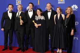 77th Golden Globe Awards - Photo Room - Beverly Hills, California, U.S., January 5, 2020 - Sam Mendes poses with with his Best Director - Motion Picture award and the cast of