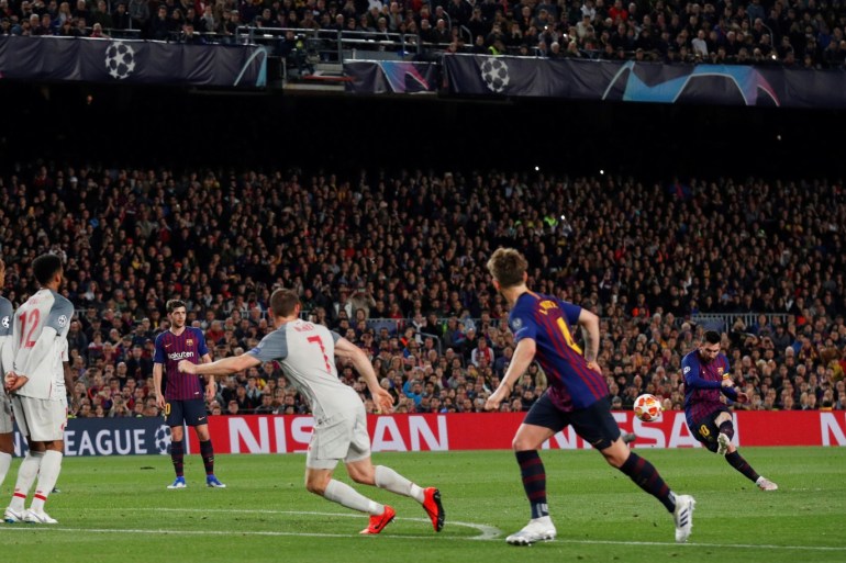 Soccer Football - Champions League Semi Final First Leg - FC Barcelona v Liverpool - Camp Nou, Barcelona, Spain - May 1, 2019 Barcelona's Lionel Messi scores their third goal from a free kick REUTERS/Albert Gea