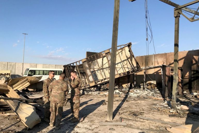 U.S. soldiers are seen at the site where an Iranian missile hit at Ain al-Asad air base in Anbar province, Iraq January 13, 2020. REUTERS/John Davison