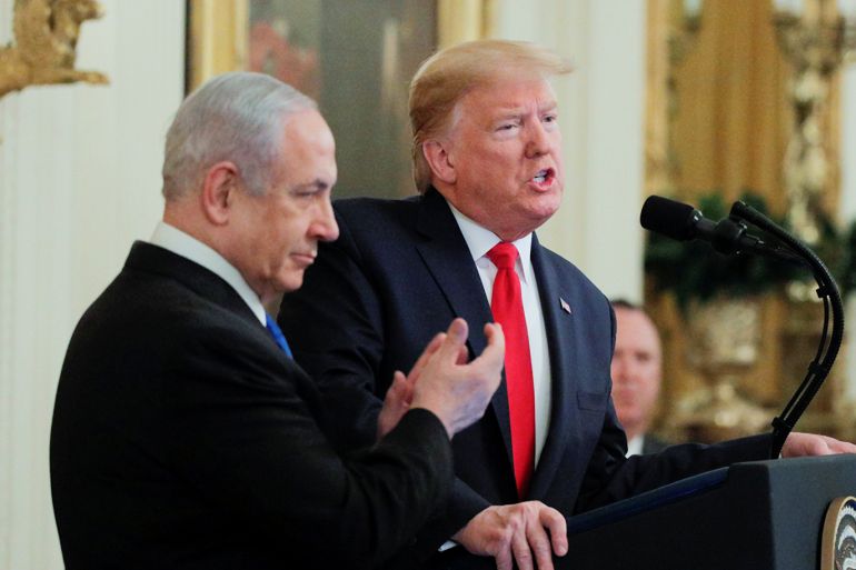 U.S. President Donald Trump and Israel's Prime Minister Benjamin Netanyahu hold a joint news conference to discuss a new Middle East peace plan proposal in the East Room of the White House in Washington, U.S., January 28, 2020. REUTERS/Brendan McDermid