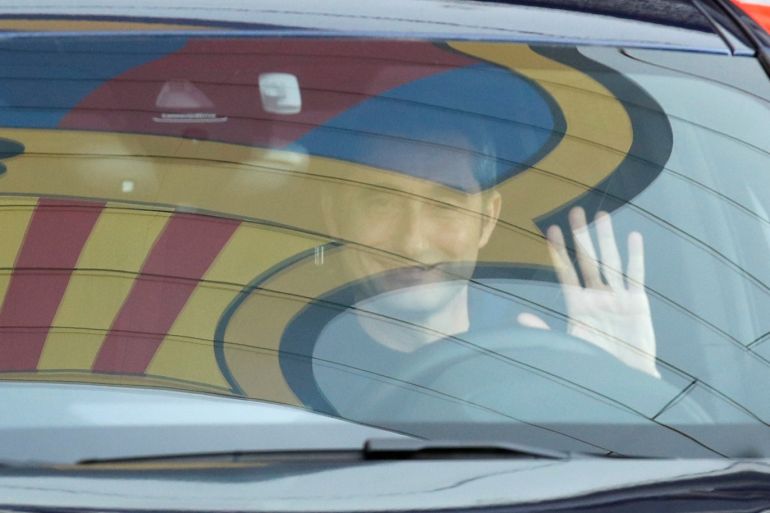 FC Barcelona's coach Ernesto Valverde leaves Joan Gamper training camp, as the team's logo is reflected on the window of his car, Barcelona, Spain January 13, 2020. REUTERS/Albert Gea