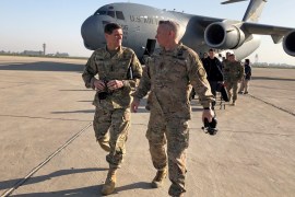 U.S. Army General Joseph Votel (L), head of the U.S. military’s Central Command, walks with U.S. Army Lieutenant General Paul LaCamera commander of the U.S.-led coalition against Islamic State, after landing in Baghdad, Iraq February 17, 2019. REUTERS/Phil Stewart
