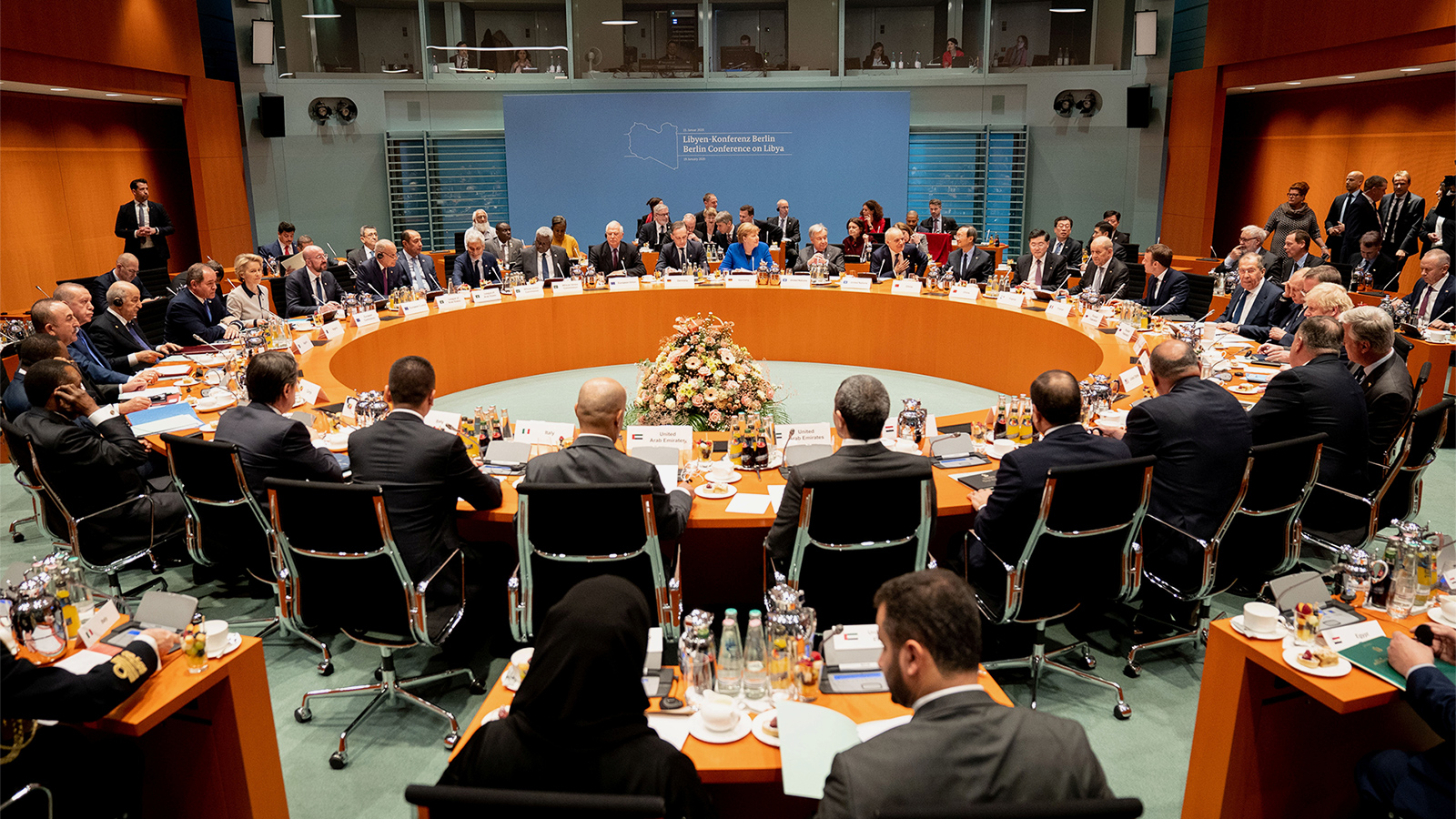 ‪(رويترز)‬ المشاركون في مؤتمر برلين بشأن الأزمة الليبية