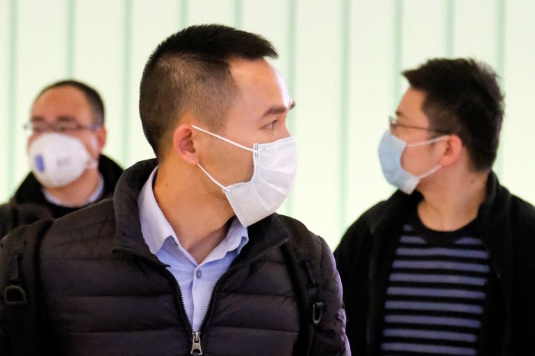 Passengers arrive at LAX from Shanghai, China, after a positive case of the coronavirus was announced in the Orange County suburb of Los Angeles, California, U.S., January 26, 2020. REUTERS/Ringo Chiu