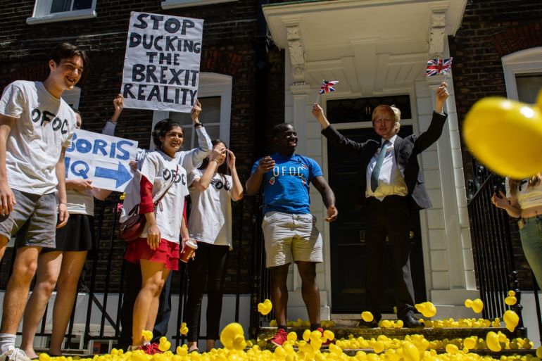 LONDON, ENGLAND - JUNE 27: Protesters hold a demonstration with rubber ducks and costumes outside the campaign headquarters of Boris Johnson MP on June 27, 2019 in London, England. Conservative party leadership rivals Boris Johnson and Jeremy Hunt have unveiled pledges on immigration and education in their on going campaigns to become the United Kingdom's next Prime Minister. (Photo by Chris J Ratcliffe/Getty Images)
