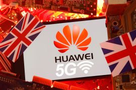 The British flag and a smartphone with a Huawei and 5G network logo are seen on a PC motherboard in this illustration picture taken January 29, 2020. REUTERS/Dado Ruvic/Illustration