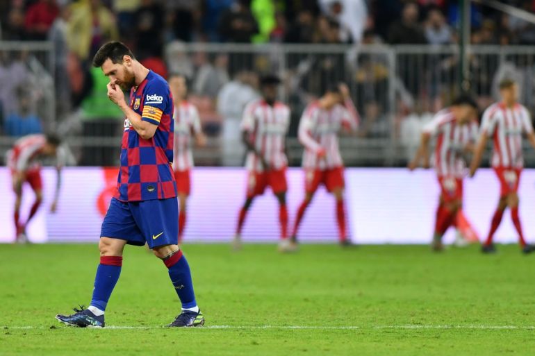 Soccer Football - Spanish Super Cup - Semi Final - FC Barcelona v Atletico Madrid - King Abdullah Sports City, Jeddah, Saudi Arabia - January 9, 2020 Barcelona's Lionel Messi looks dejected after Alvaro Morata scored the second goal for Atletico Madrid from the penalty spot REUTERS/Waleed Ali