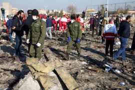 Security officers and Red Crescent workers are seen at the site where the Ukraine International Airlines plane crashed after take-off from Iran's Imam Khomeini airport, on the outskirts of Tehran, Iran January 8, 2020. Nazanin Tabatabaee/WANA (West Asia News Agency) via REUTERS ATTENTION EDITORS - THIS IMAGE HAS BEEN SUPPLIED BY A THIRD PARTY