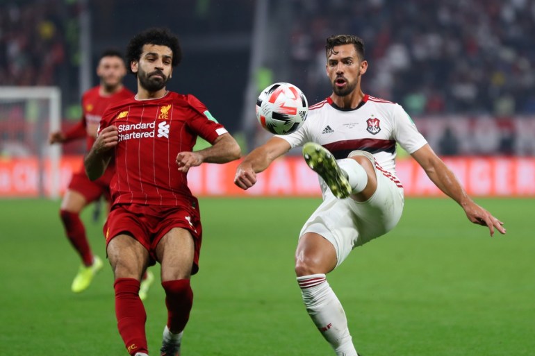 DOHA, QATAR - DECEMBER 21: Pablo Mari of CR Flamengo controls the ball ahead of Mohamed Salah of Liverpool during the FIFA Club World Cup Qatar 2019 Final between Liverpool FC and CR Flamengo at Education City Stadium on December 21, 2019 in Doha, Qatar. (Photo by Francois Nel/Getty Images)