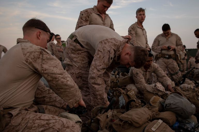 U.S. Marines assigned to Special Purpose Marine Air-Ground Task Force-Crisis Response-Central Command 19.2 prepare to deploy to reinforce Baghdad's U.S. embassy from a base in Kuwait December 31, 2019. U.S. Marine Corps/Sgt. Robert G. Gavaldon/Handout via REUTERS. THIS IMAGE HAS BEEN SUPPLIED BY A THIRD PARTY.