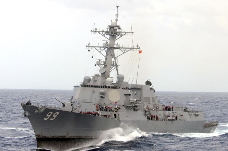 The guided-missile destroyer USS Farragut is shown in this undated photo operating in heavy seas in the Atlantic Ocean. Iranian forces boarded a Marshall Islands-flagged cargo ship in the Gulf on Tuesday after patrol boats fired warning shots across its bow and ordered it deeper into Iranian waters, the Pentagon said. The closest U.S. warship was more than 60 miles away, he said, and the U.S. military instructed destroyer USS Farragut to head towards the cargo ship, wh