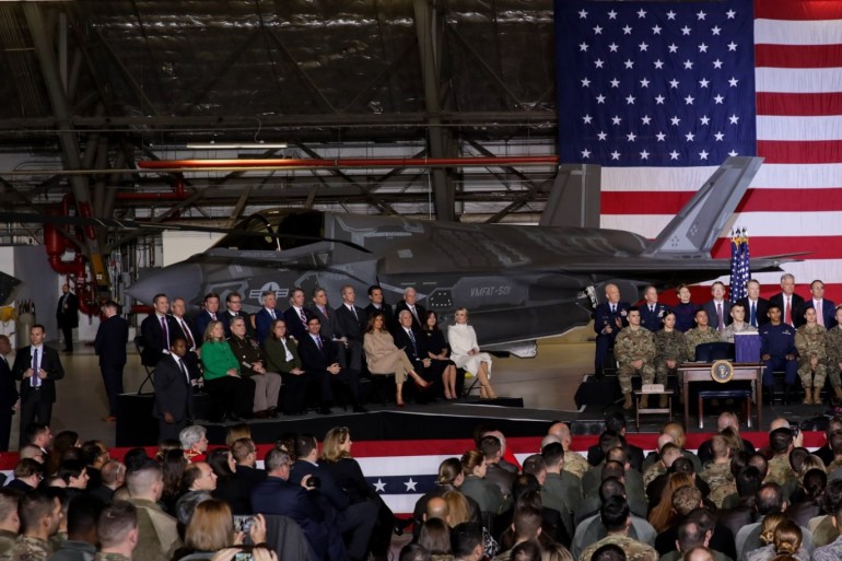 Trump signs into law 2020 defense spending bill- - MARYLAND, USA - DECEMBER 20: U.S. President Donald Trump makes a speech as he attends a signing ceremony at Joint Base Andrews, in Maryland, United States on December 20, 2019. U.S. President Donald Trump signed into law Friday the 2020 defense spending bill. The 2020 National Defense Authorization Act (NDAA) authorizes a top-line budget of $738 billion, which includes $635 billion for base Pentagon spending, $23.1 billion for Energy Department nuclear weapons programs, $71.5 billion for war operations and $5.3 billion for emergency disaster recovery for military bases.