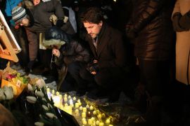 OTTAWA, ON - JANUARY 09: Justin Trudeau Prime Minister of Canada place a candle on Parliament Hill during vigil for the victims who were killed in a plane crash in Iran on January 9, 2020 in Ottawa, Canada. Dave Chan/Getty Images/AFP== FOR NEWSPAPERS, INTERNET, TELCOS & TELEVISION USE ONLY ==