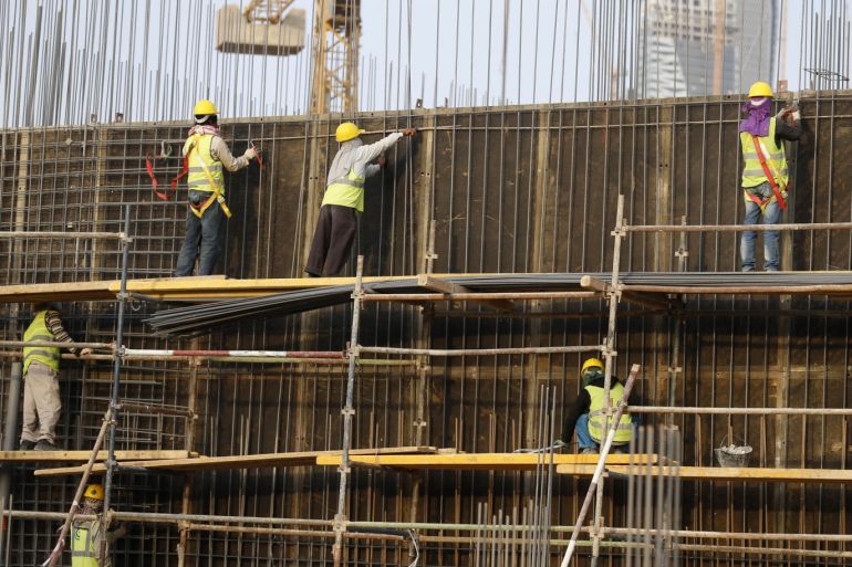 Indian labourers work at the construction site of a building in Riyadh November 16, 2014. India is pressing rich countries in the Gulf to raise the wages of millions of Indians working there, in a drive that could secure it billions of dollars in fresh income but risks pricing some of its citizens out of the market. Picture taken November 16. To match story INDIA-MIDEAST/WORKERS REUTERS/Faisal Al Nasser (SAUDI ARABIA - Tags: BUSINESS CONSTRUCTION EMPLOYMENT)