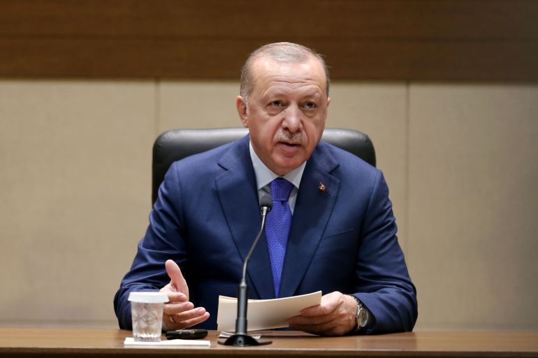 Turkish President Recep Tayyip Erdogan- - ISTANBUL, TURKEY - JANUARY 19: Turkish President Recep Tayyip Erdogan speaks to media ahead of his departure to Berlin for attending Berlin Conference on Libyan peace, at the Ataturk Airport in Istanbul, Turkey on January 19, 2020.