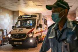 HONG KONG, CHINA - JANUARY 22: A security official stands guard as an ambulance arrives with a patient to the Infectious Disease Centre of Princess Margaret Hospital on January 22, 2020 in Hong Kong, China. Hong Kong reported its first two cases of Wuhan coronavirus infections as the number of those who have died from the virus in China climbed to seventeen on Wednesday and cases have been reported in other countries including the United States,Thailand, Japan, Taiwan,