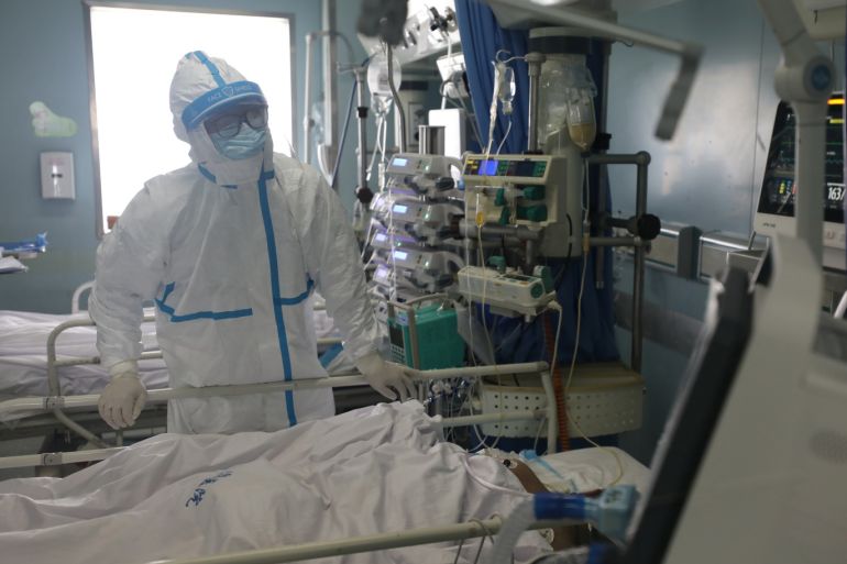 A medical worker is seen at the intensive care unit (ICU) of Jinyintan hospital in Wuhan, the epicentre of the novel coronavirus outbreak, in Hubei province, China February 13, 2020. Picture taken February 13, 2020. China Daily via REUTERS ATTENTION EDITORS - THIS IMAGE WAS PROVIDED BY A THIRD PARTY. CHINA OUT.