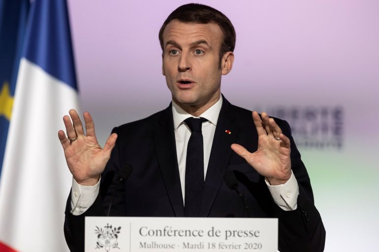 French President Emmanuel Macron gestures as he delivers a speech during a press conference, as a part of his visit in Mulhouse, France February 18, 2020. Jean-Francois Badias/Pool via REUTERS