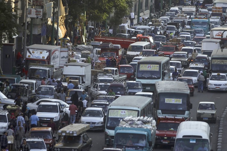 Cars are stuck in a traffic jam in downtown Cairo September 4, 2013. Egypt's population has reached 85 million with the Cairo governorate coming in with the highest number at 8.9 million people, according to the Central Agency for Public Mobilization and Statistics (CAPMAS). REUTERS/Amr Abdallah Dalsh (EGYPT - Tags: SOCIETY TRANSPORT)