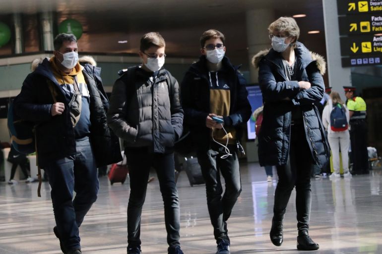 A family from France arrives at Josep Tarradellas Barcelona-El Prat Airport from Venezia, before traveling towards France, where cases of novel coronavirus has been confirmed in Barcelona, Spain February 26, 2020. REUTERS/Nacho Doce