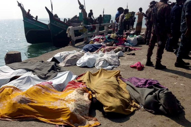 epa08210785 A view of victims' bodies covered in sheets lying on a quay after a trawler capsized off the Bay of Bengal, in Teknaf, Cox's Bazar District, Bangladesh, 11 February 2020. According to local media reports, at least 15 Rohingya refugees died after a trawler on its way to Malaysia sank off the coast in the Bay of Bengal, near St Martin's Island. Some 65 people were said to have been rescued alive, media added. The victims are said to be mostly women from Rohingya camps located in Teknaf and Ukhia Upazila of Cox's Bazar. EPA-EFE/STRINGER