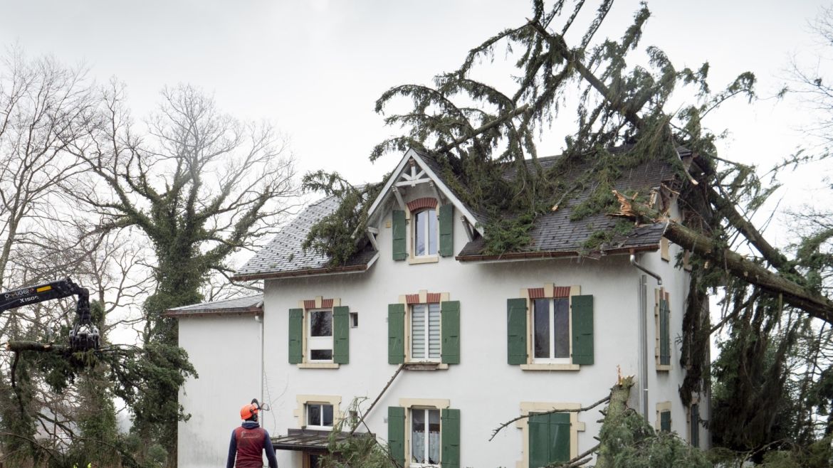 epaselect epa08208500 A view of a house damaged by fallen trees after a storm, in Montmollin, Val-de-Ruz, Switzerland, 10 February 2020. Severe warnings have been issued for Western and Northern Europe as storm Ciara -- also known as Sabine in Germany and Switzerland, and Elsa in Norway -- is bringing strong winds and heavy rains causing disruption of land and air traffic. Winter storm Ciara reached Switzerland last night. EPA-EFE/LAURENT DARBELLAY