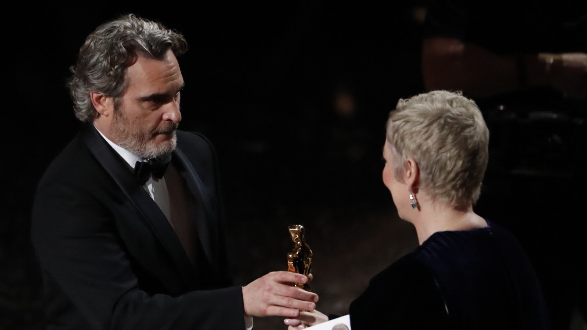 Joaquin Phoenix accepts the Oscar for Best Actor in