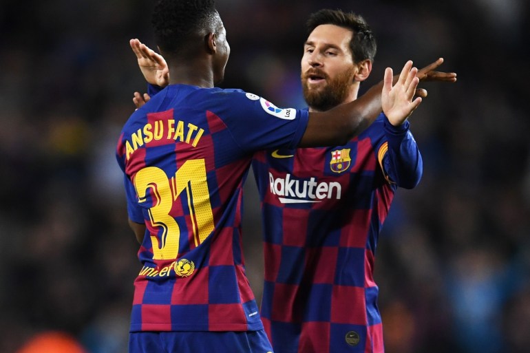 BARCELONA, SPAIN - FEBRUARY 02: Ansu Fati of FC Barcelona celebrates with Lionel Messi of FC Barcelona his sides first goal during the Liga match between FC Barcelona and Levante UD at Camp Nou on February 02, 2020 in Barcelona, Spain. (Photo by David Ramos/Getty Images)