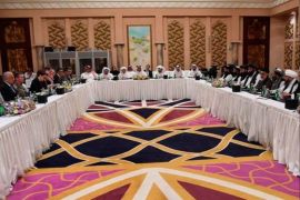 Undated Handout picture of U.S., Taliban and Qatar officials during a meeting for peace talks in Doha, Qatar. Qatari Foreign Ministry/Handout via REUTERS ATTENTION EDITORS - THIS PICTURE WAS PROVIDED BY A THIRD PARTY