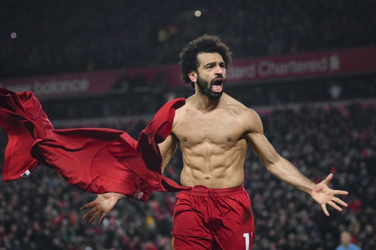 LIVERPOOL, ENGLAND - JANUARY 19: Mohamed Salah of Liverpool celebrates his goal to make it 2-0 during the Premier League match between Liverpool FC and Manchester United at Anfield on January 19, 2020 in Liverpool, United Kingdom. (Photo by Michael Regan/Getty Images)