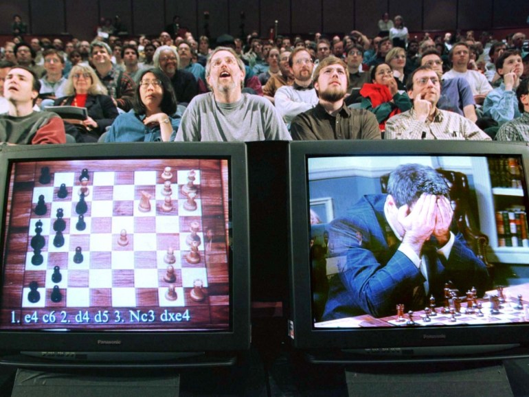 World chess champion Garry Kasparov rests his head in his hands as he is seen on a monitor during game six of the chess match against IBM supercomputer Deep Blue , May 11, 1997. The supercomputer made chess history Sunday when it defeated Kasparov for an overall victory in their six game re-match, the first time a computer has triumphed over a reigning world champion in a classical match. Kasparov resigned after 19 moves. REUTERS/Peter Morgan