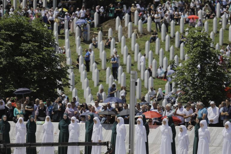 24th anniversary of Srebrenica Genocide- - SREBRENICA, BOSNIA AND HERZEGOVINA - JULY 11: A view of the Srebrenica–Potocari Memorial, during the burial of recently identified remains of 33 victims of Srebrenica Genocide on the 24th anniversary of Srebrenica Genocide on July 11, 2019 in Srebrenica, Bosnia and Herzegovina. Minister of Youth and Sports of Turkey Mehmet Muharrem Kasapoglu, deputies, representatives of international institutions in the country, politicians, diplomats, and about thousands of people attended the ceremony. More than 8,000 Bosnian Muslim men and boys were killed after Bosnian Serb forces attacked the UN