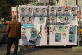 صور المرشحين للانتخابات البرلمانية في إيران تكاد لا تكون موجودة في شوارع طهران (الجزيرة نت