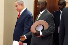 Israeli Prime Minister Benjamin Netanyahu and Ugandan President Yoweri Museveni arrive for a news conference at the State House in Entebbe, Uganda February 3, 2020. REUTERS/Abubaker Lubowa NO RESALES. NO ARCHIVES