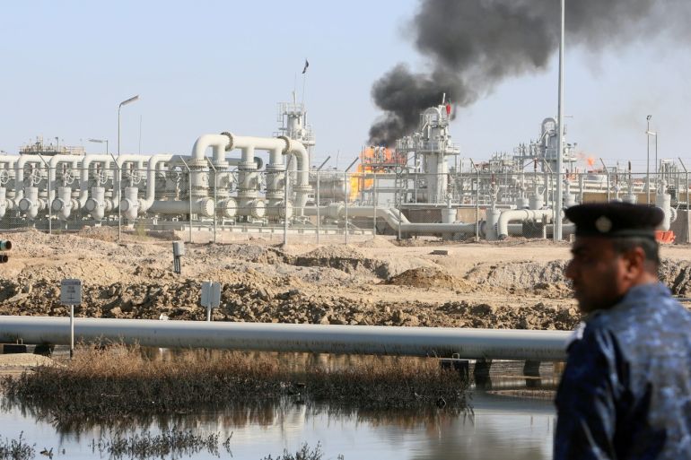 A policeman is seen at West Qurna-1 oil field, which is operated by ExxonMobil, in Basra, Iraq January 9, 2020. REUTERS/Essam al-Sudani