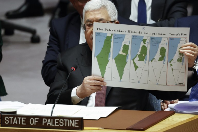 epa08211624 President of the State of Palestine Mahmoud Abbas (C) holds up a map of Palestine in 1917, 1937, 1947, 1967 and 2020 as he addresses the UN Security Council about the situation in the Middle East, including the Palestinian question at United Nations headquarters in New York, New York, USA, 11 February 2020. EPA-EFE/JASON SZENES